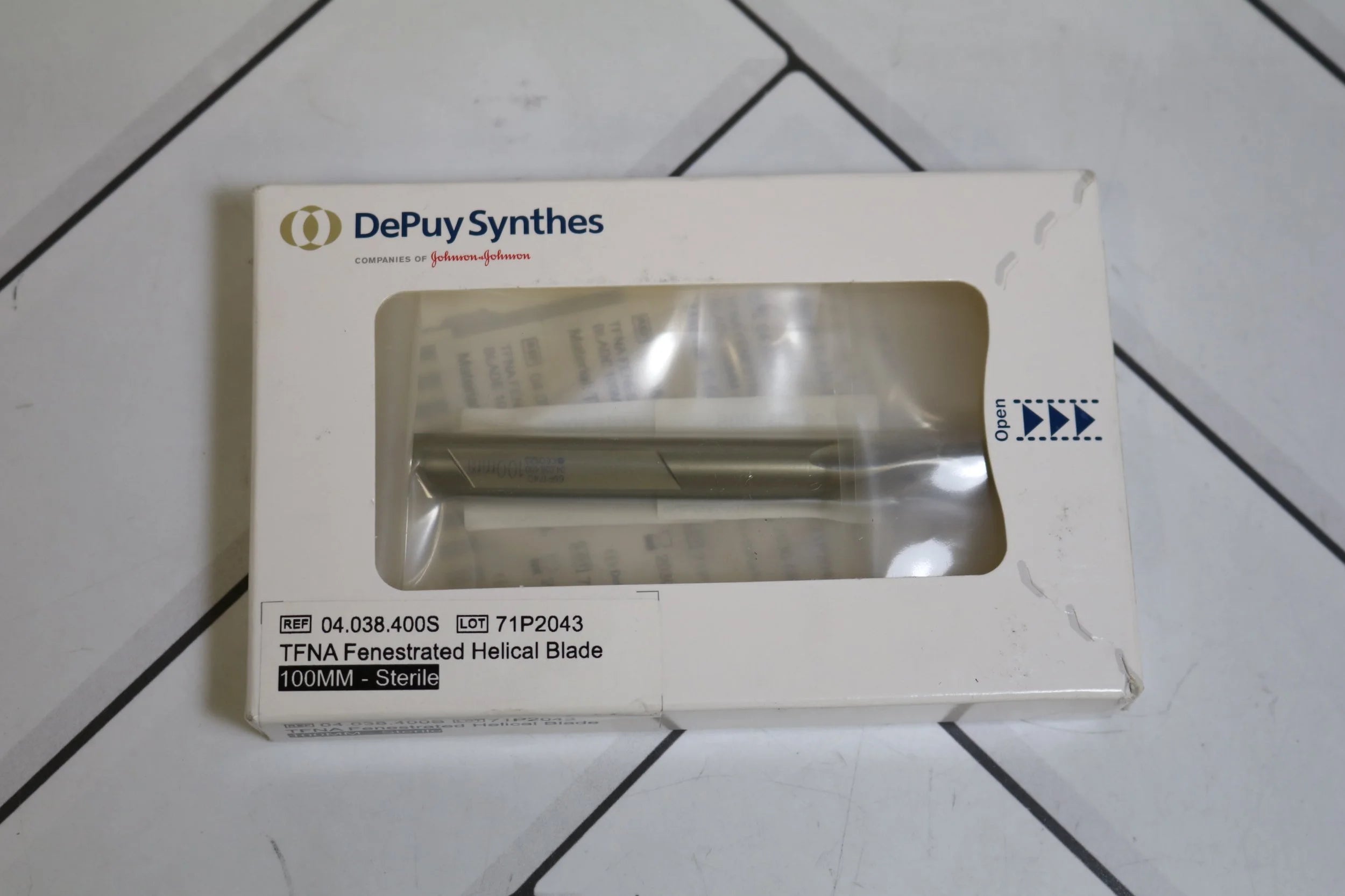 Depuy Synthes | 04.038.400S | TFNA Fenestrated Helical Blade Helical Blade, 100 mm Length, Gold, Titanium Alloy, Perforated, Single-Use